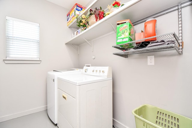 laundry room with washer and dryer