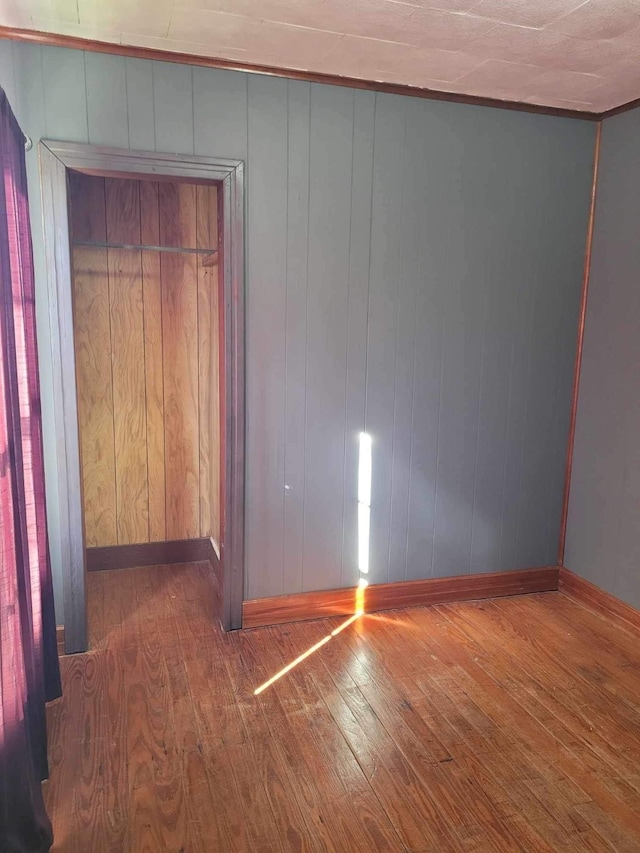 empty room featuring hardwood / wood-style flooring