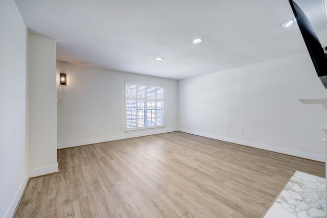 empty room featuring light hardwood / wood-style flooring