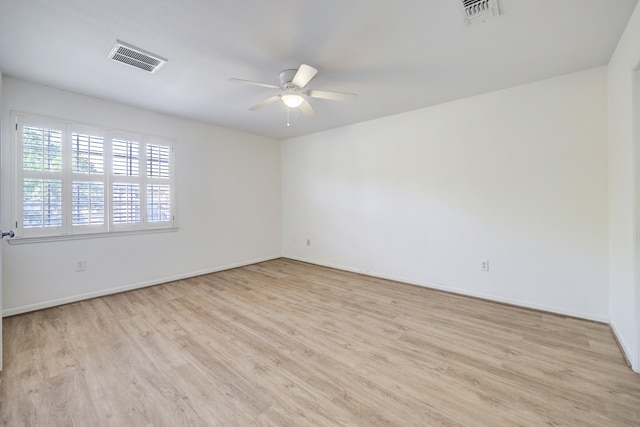 unfurnished room featuring ceiling fan and light hardwood / wood-style flooring