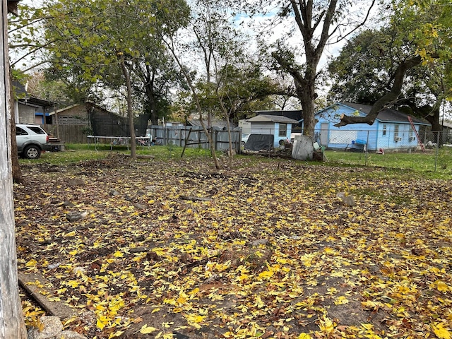 view of yard featuring a trampoline