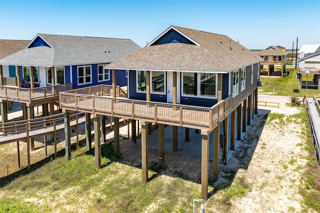 rear view of property with a deck