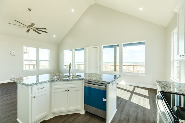 kitchen with dark wood-type flooring, dishwasher, white cabinetry, and a center island with sink