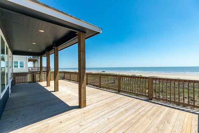 wooden terrace with a water view