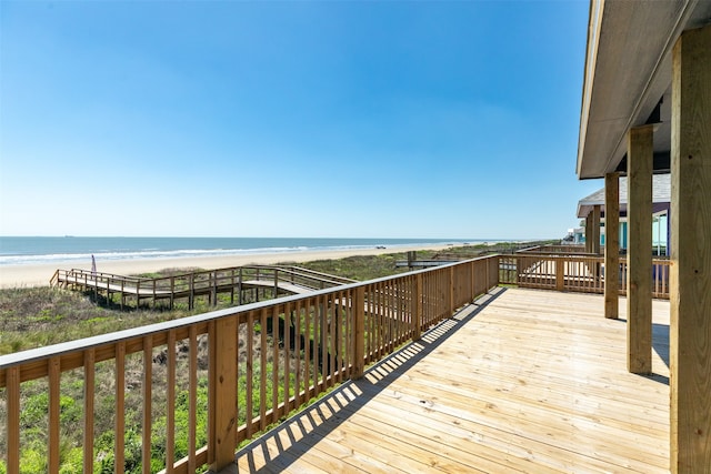 wooden deck with a water view