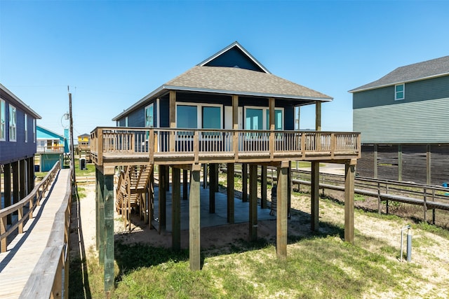 back of property featuring a deck