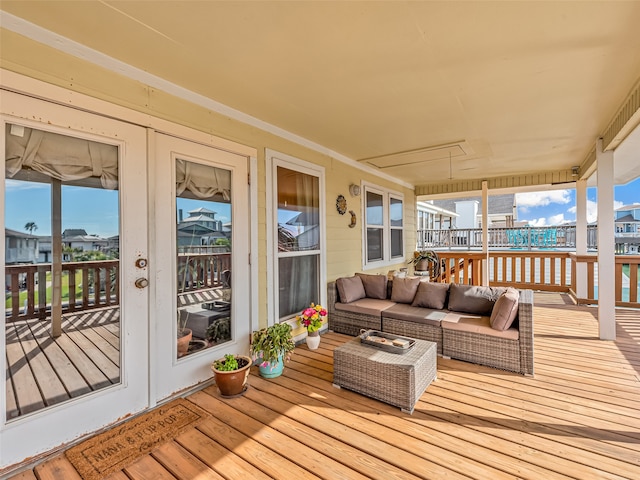 wooden deck with outdoor lounge area