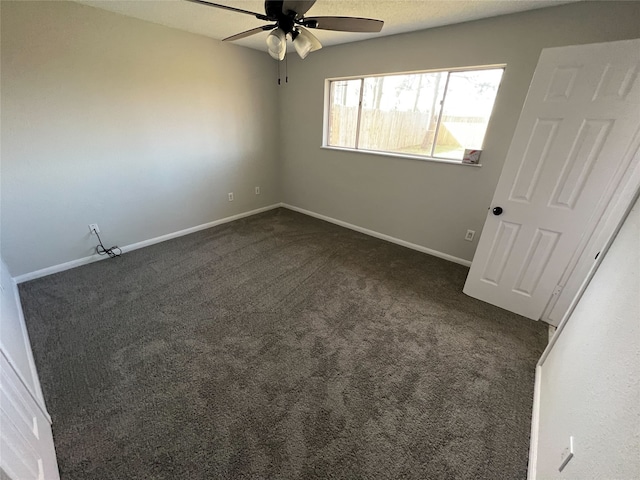 interior space with ceiling fan