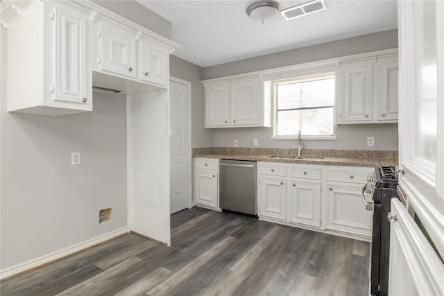 kitchen featuring sink, dishwasher, range with gas stovetop, and white cabinetry