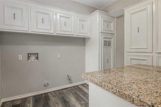 laundry area featuring washer hookup, gas dryer hookup, and wood-type flooring