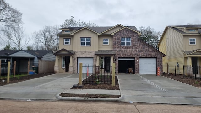 view of front of house featuring brick siding, concrete driveway, an attached garage, and fence