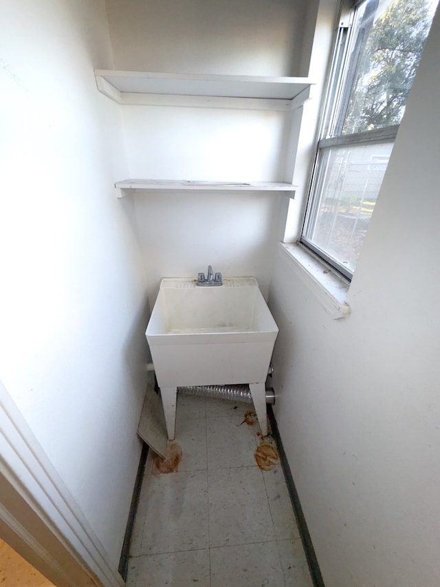 washroom featuring tile patterned flooring