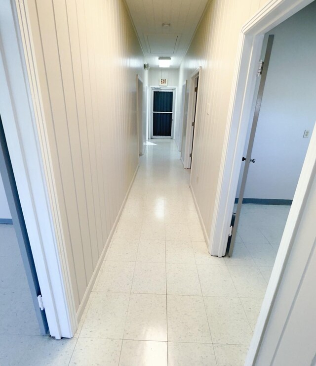 hallway with light tile patterned flooring