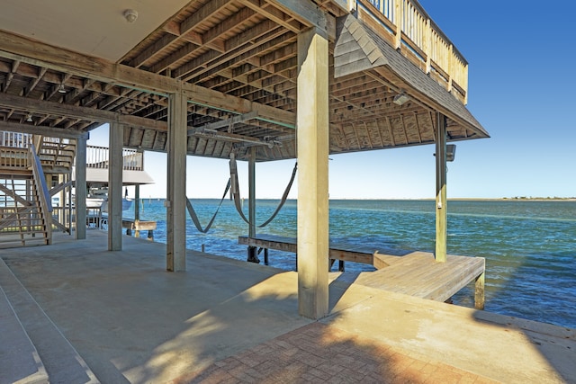 view of dock with a water view