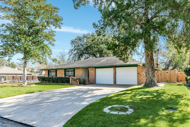 single story home with a garage and a front yard