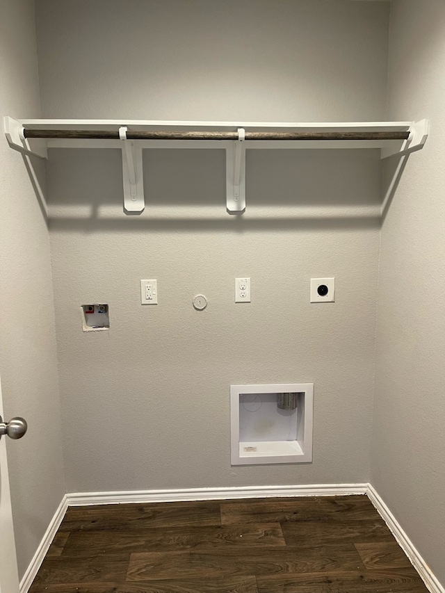 laundry area with gas dryer hookup, hookup for a washing machine, dark hardwood / wood-style floors, and electric dryer hookup