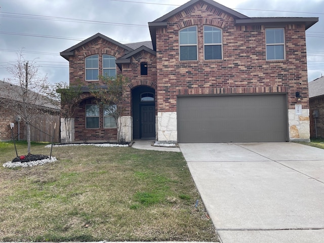 front of property with a garage and a front lawn