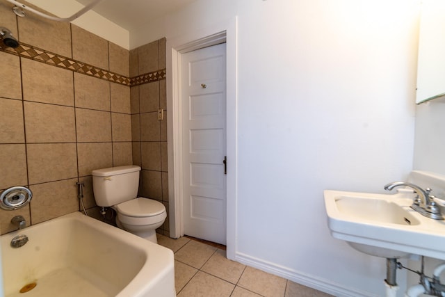 full bathroom with tile patterned flooring, washtub / shower combination, sink, tile walls, and toilet