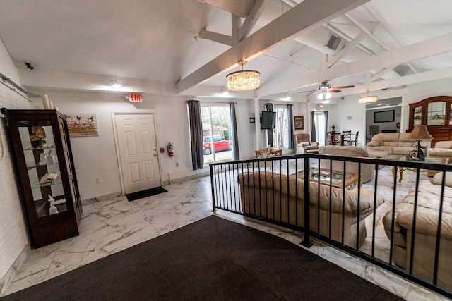 reception with ceiling fan with notable chandelier