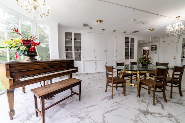 dining room featuring a notable chandelier