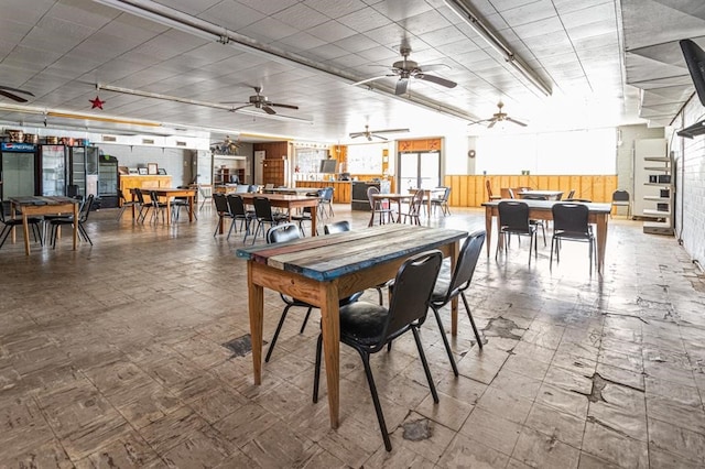 dining area featuring ceiling fan and light tile patterned floors