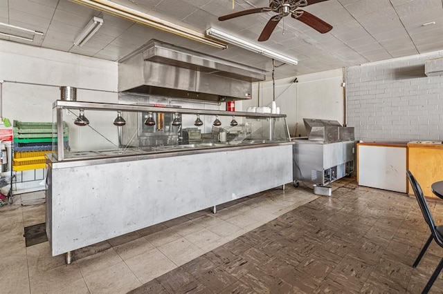 interior space featuring ceiling fan