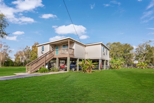 exterior space with a carport and a front yard