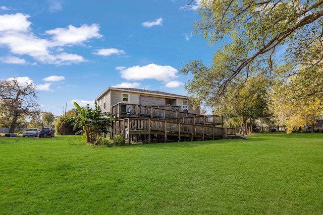 view of yard featuring a wooden deck