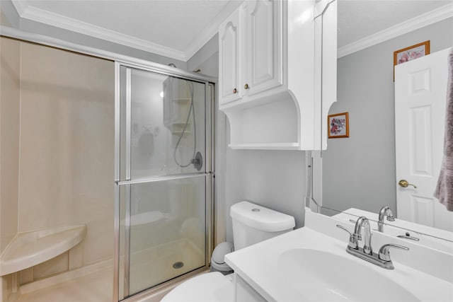 bathroom featuring walk in shower, vanity, crown molding, and toilet