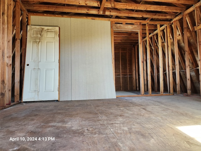 misc room with wood walls