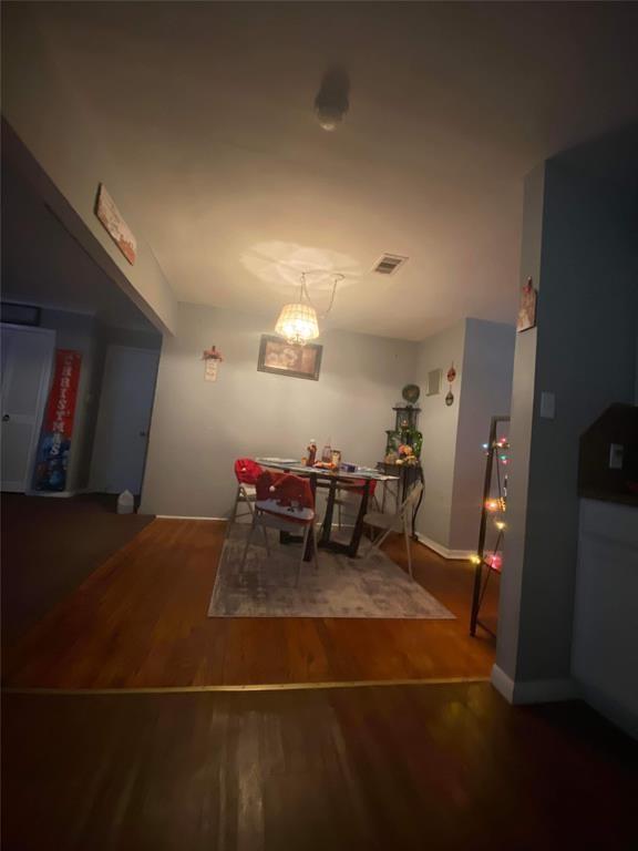 dining area featuring hardwood / wood-style floors