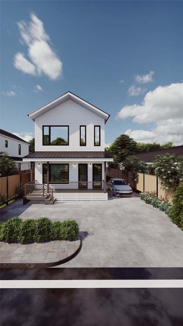 rear view of house with a porch