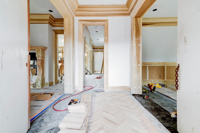 interior space featuring parquet floors and ornamental molding