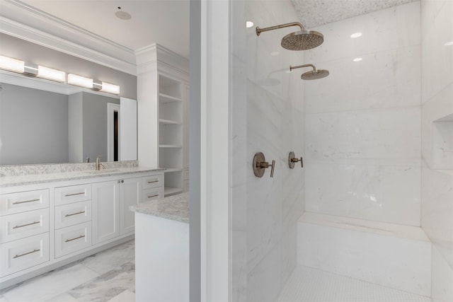 bathroom featuring vanity and a tile shower