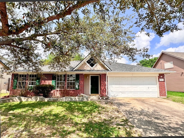 single story home featuring a front yard and a garage