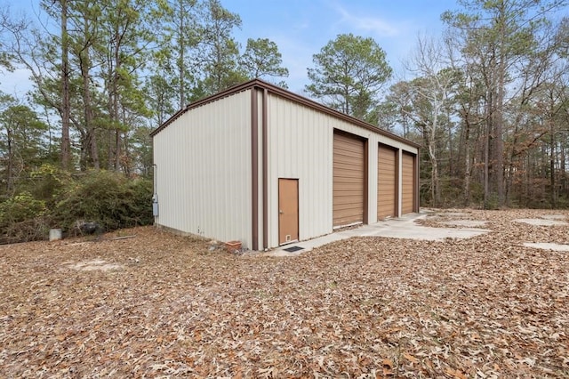 view of outbuilding with a garage