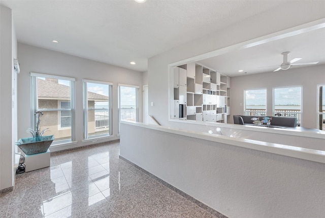 kitchen featuring plenty of natural light and ceiling fan