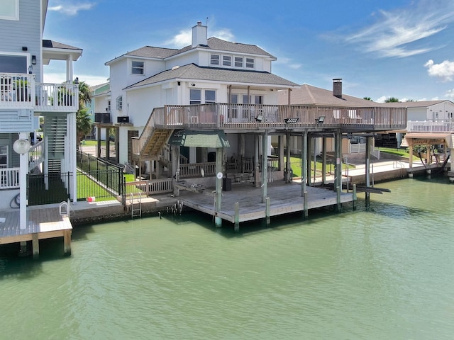 view of dock featuring a deck with water view