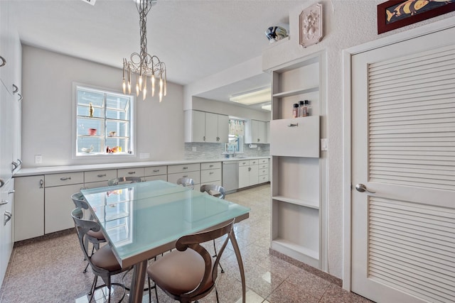 dining area featuring a chandelier