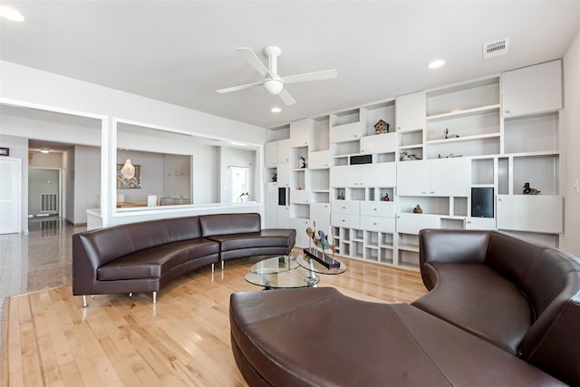 living room with ceiling fan