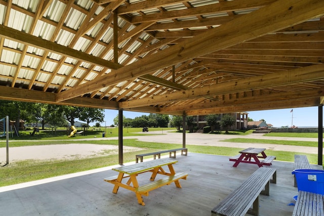 view of home's community with a yard and volleyball court