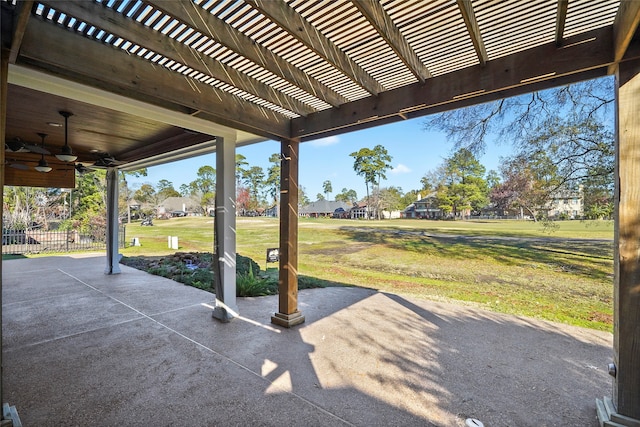 view of patio with ceiling fan and a pergola