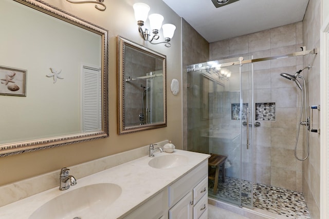 bathroom with vanity and an enclosed shower