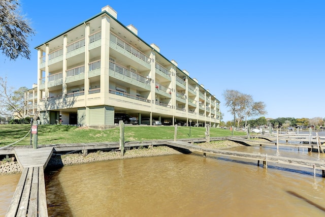 dock area featuring a water view