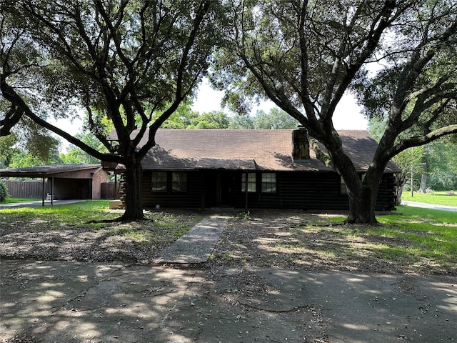 view of front of house featuring a carport