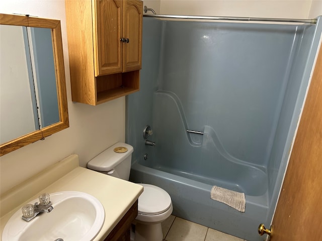 full bathroom featuring bathtub / shower combination, vanity, toilet, and tile patterned floors