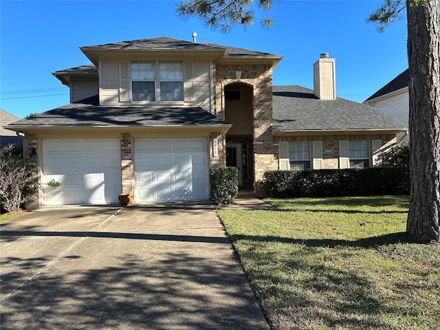 view of front of house featuring a garage and a front lawn