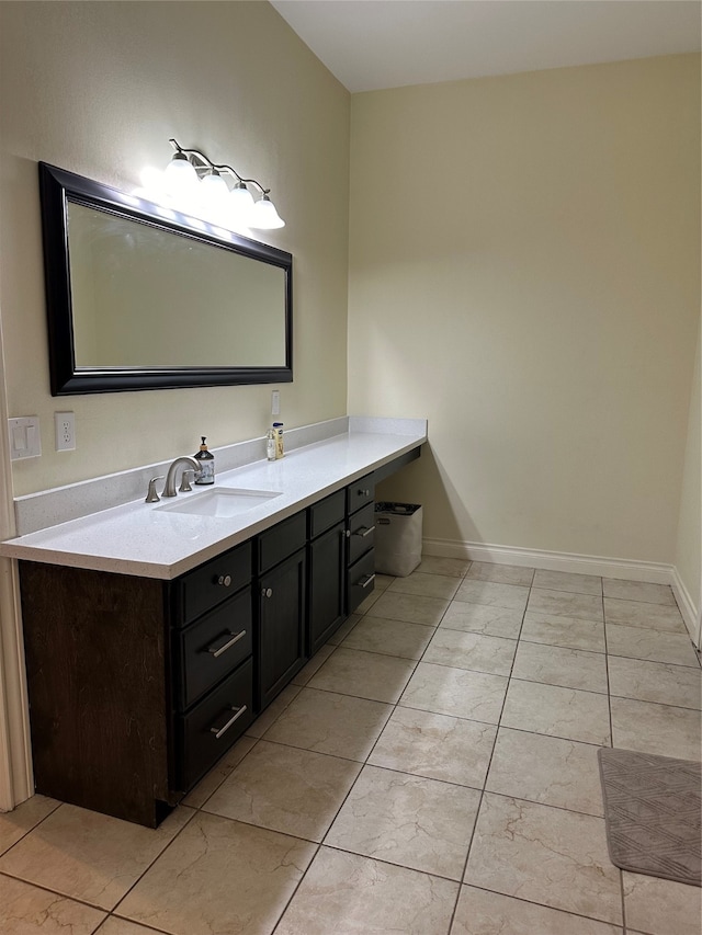 bathroom featuring tile patterned floors and vanity