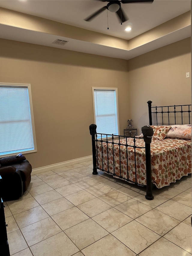 bedroom featuring ceiling fan and light tile patterned floors