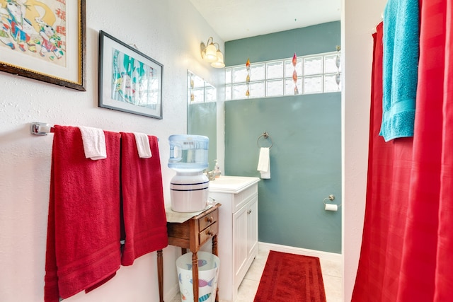 bathroom featuring vanity and tile patterned flooring